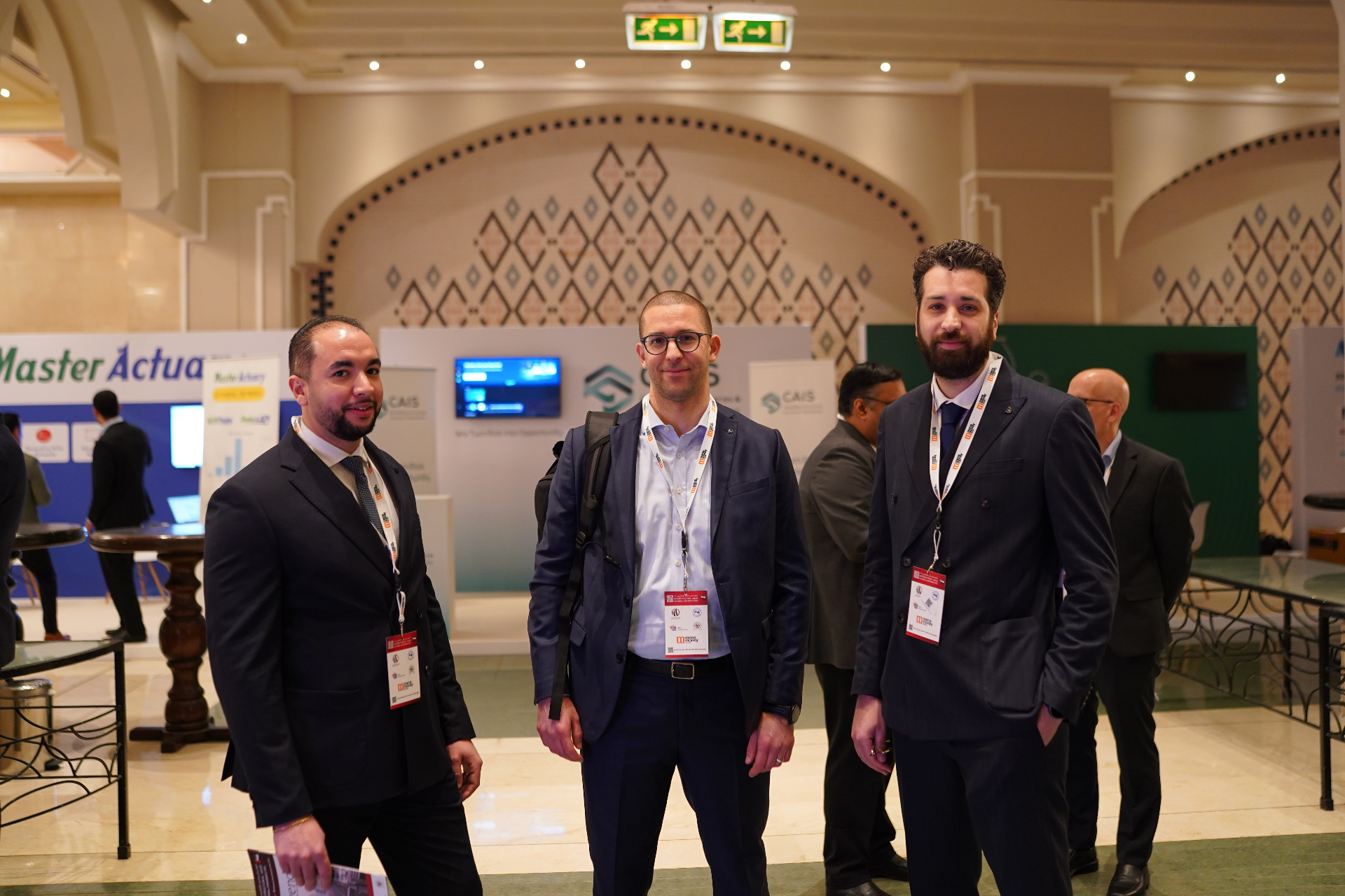 Jonas Osman with peers at the CAIS stand during the International Arab Actuarial Conference
